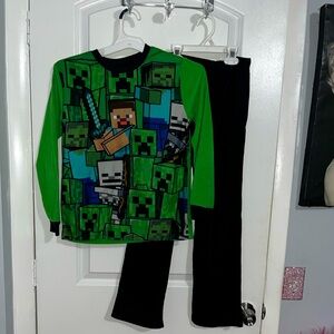 Boys pajama lot mostly size 10/12 however the 2 pair of Dino PJs-12/14